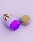 Purple rose toy elegantly presented on a platform, emphasizing the luxurious rose sex toy and rose vibrator for discreet use