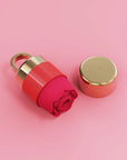 Red rose toy placed on a stylish display stand, highlighting the sophisticated design of the rose sex toy and rose vibrator