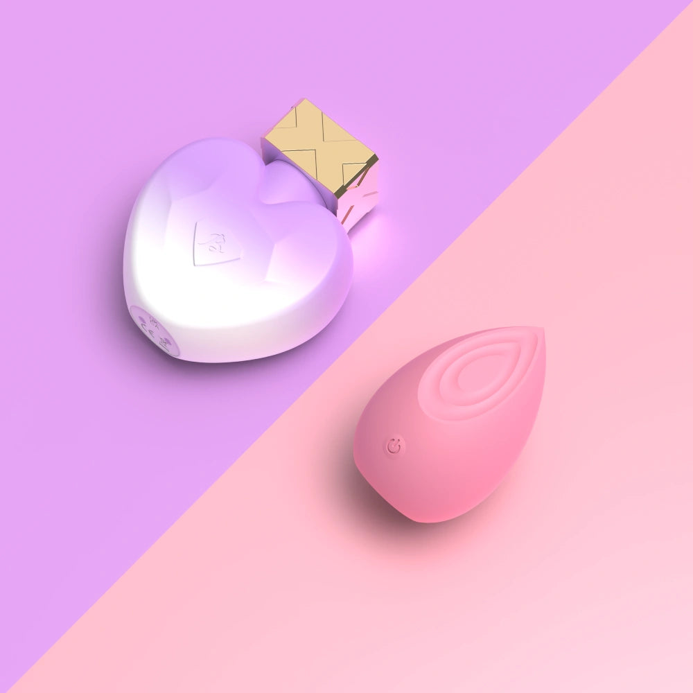 Compact discreet vibrator showcased together with a clit sucker.