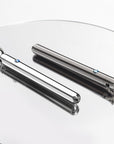 Bullet vibrator is placed on a mirror, revealing the exquisite stainless steel material.